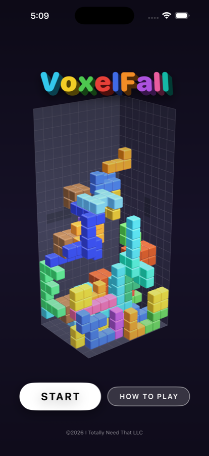 The VoxelFall title screen, with a three-dimensional well of coloured blocks behind it